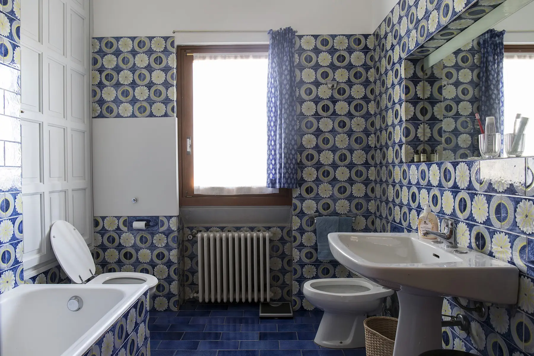 Bathroom with blue tiles