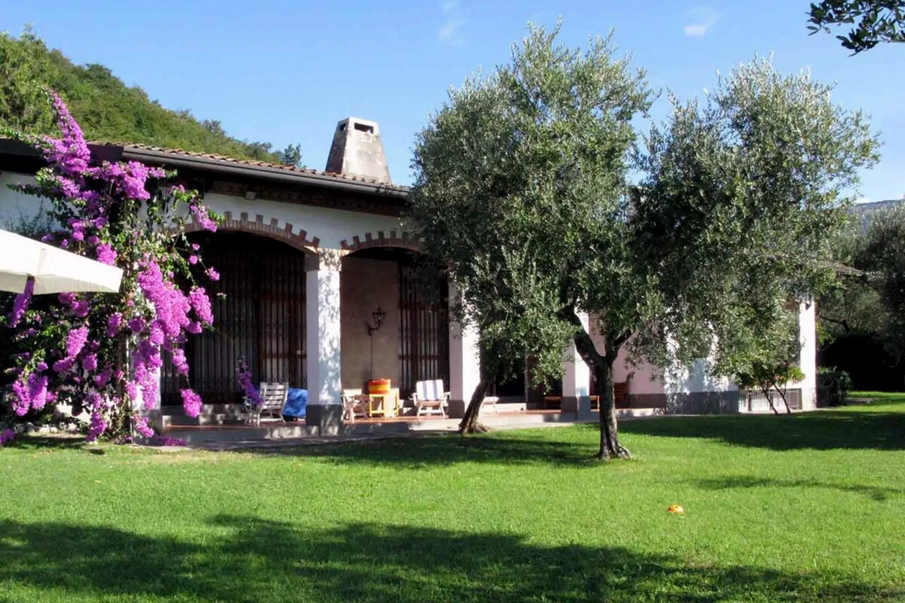 The porch of Villa Panorama with bougainvillea
